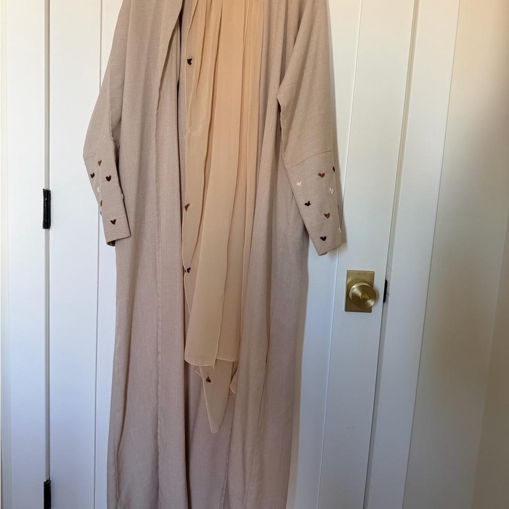 Beige abaya with heart details
